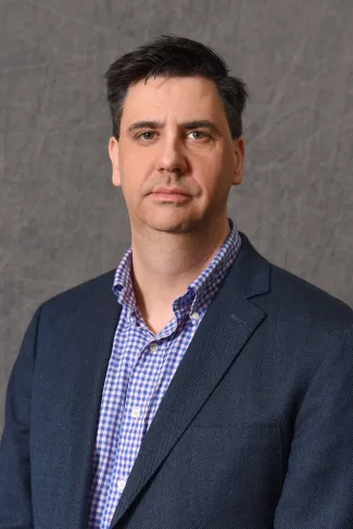 Headshot of Timothy  Stinson